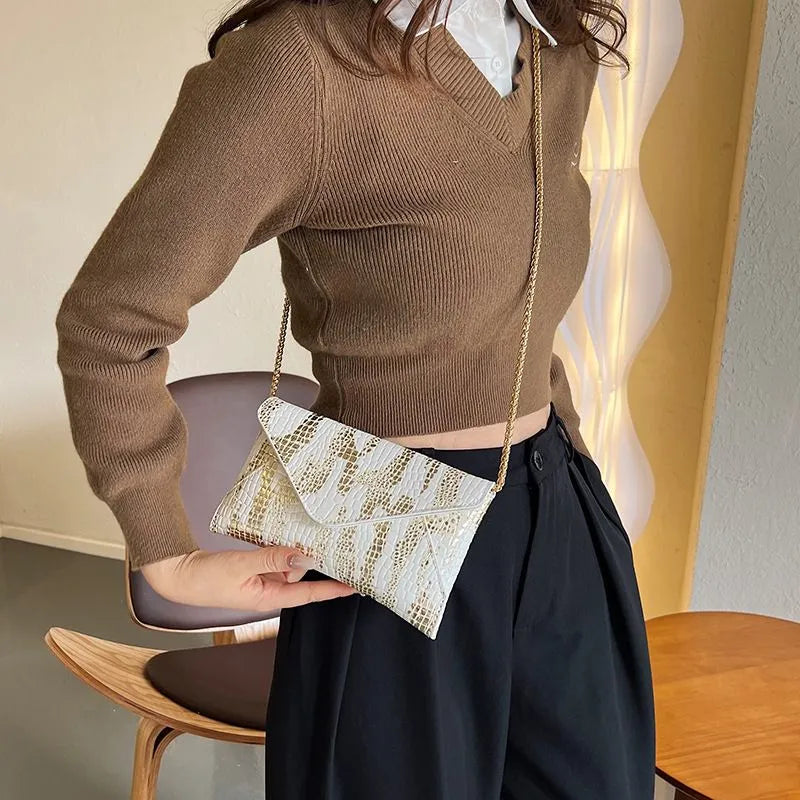 Eksklusive Designer Clutches i Assorterede Teksturer
